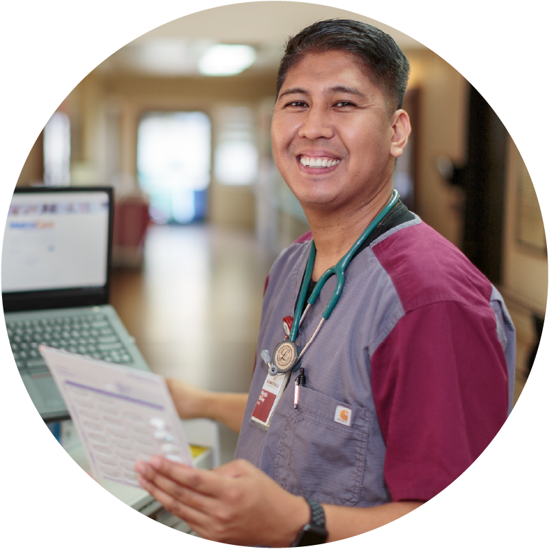 Clinical worker smiling at the camera