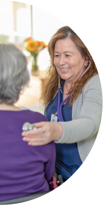 Nurse helping patient